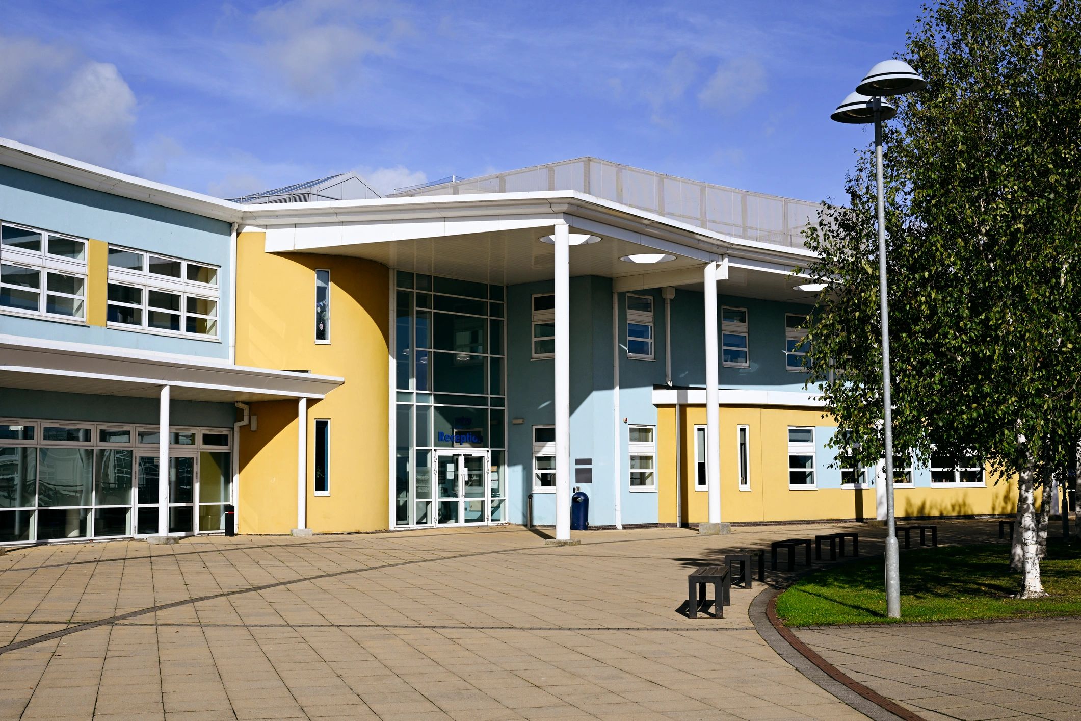 Clean exterior walkway and property frontage